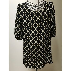 Simple dress with coral bow on back